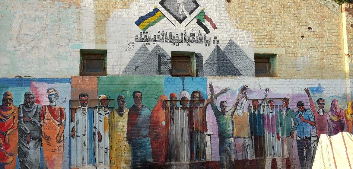 A drawing from the 2019 revolution that is intended to depict the various population groups of Sudan. Photo: Alex Waiblinger 2020/21.ungsgruppen aus dem Sudan abbilden soll. Foto: Alex Waiblinger 2020/21