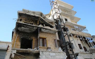 "Die Luft hat einen anderen Duft, eine andere Farbe. Die benachbarten Gebäude sind wegen der Brände schwarz eingefärbt. Es sieht aus, als wäre ein Vulkan ausgebrochen." Wohnhäuser in Aleppo. Foto: IHH Humanitarian Relief Foundation/Flickr (cc-by-nc-nd 2.0)