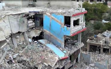 Zerstörte Schule in Zamalka. In dem Damaszener Vorort soll es in der Nacht von Dienstag auf Mittwoch zu einem Giftgasangriff des Regimes gekommen sein. Foto: Flickr/ FreedomHouse cc