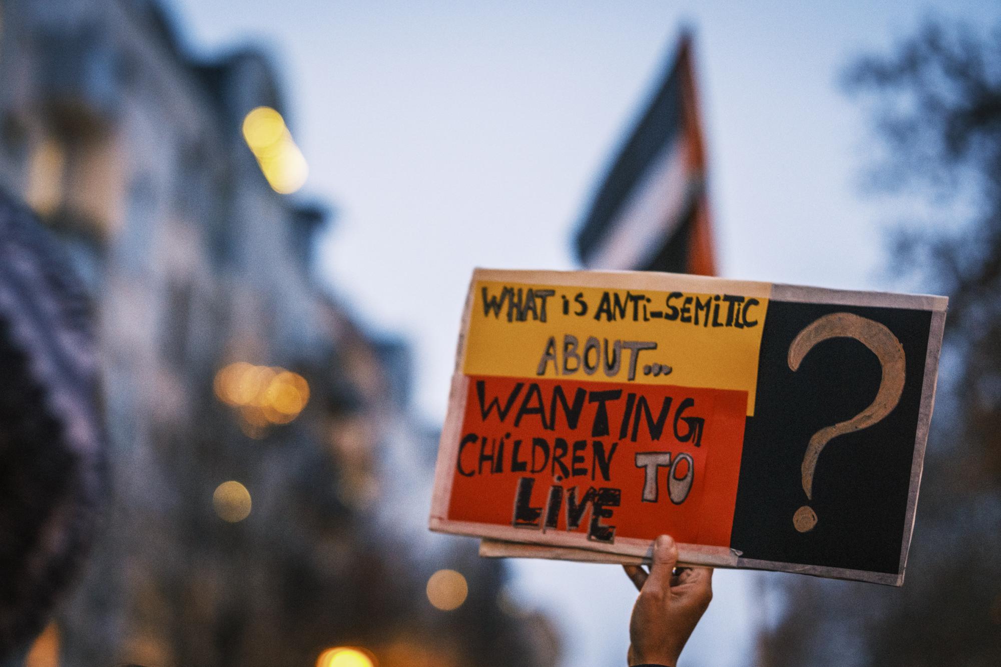 A sign at a protest in Berlin. Photo: Wael Eskander